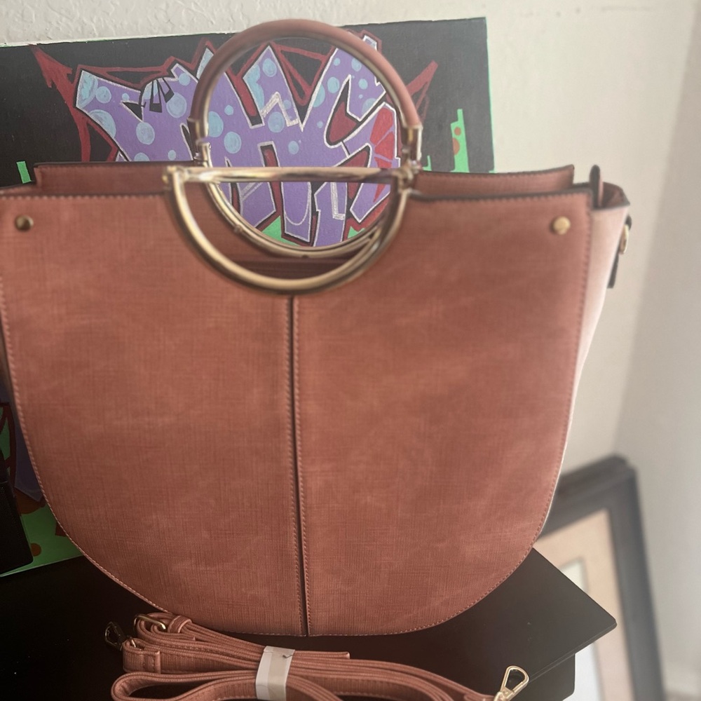 Elegant Pink Handbag with Gold Accents